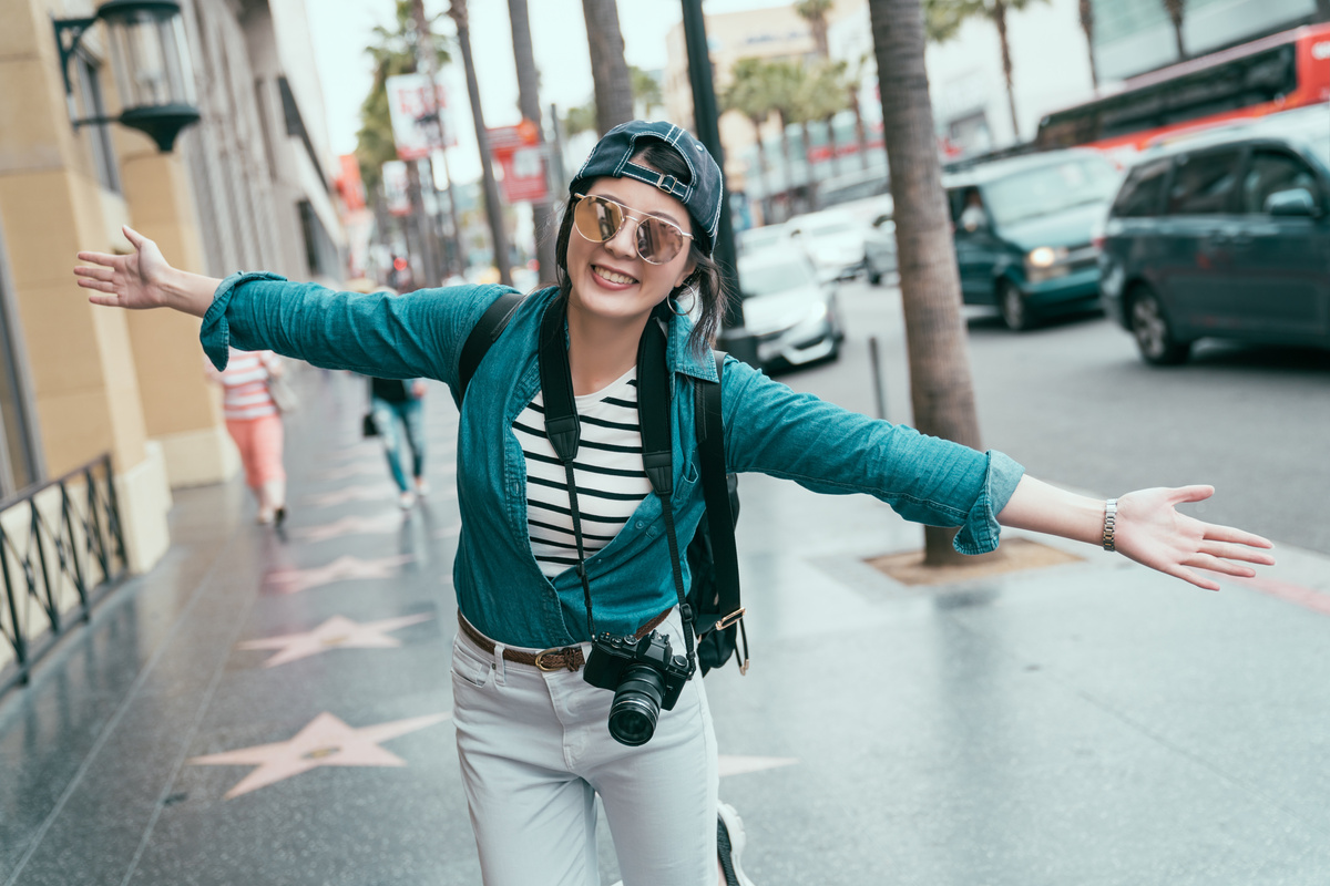 Happy Tourist in Hollywood Walk